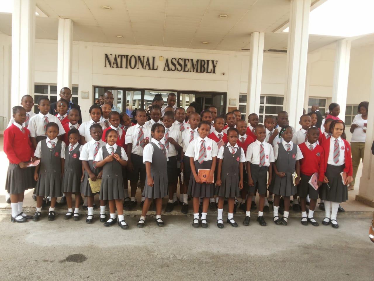 Baybos pupils outside the National Assembly building, Abuja
